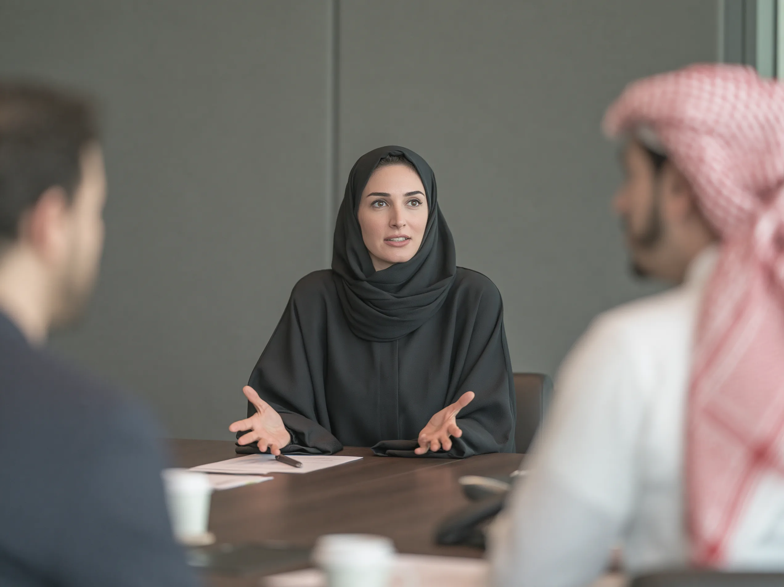Business meeting with colleagues around a table