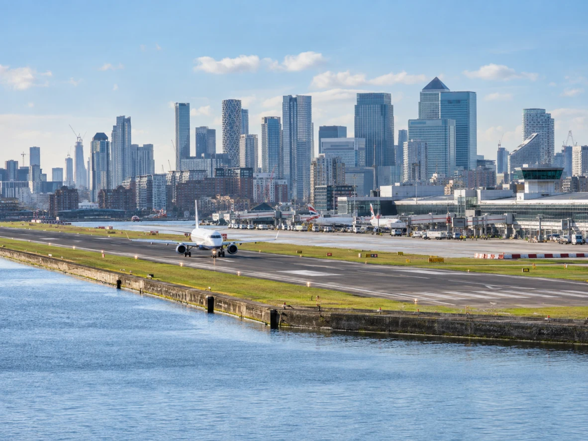 London City Airport runway beside the Thames and Canary Wharf